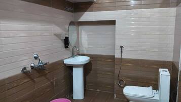 Deluxe Single Room, City View | Bathroom | Shower, towels, soap