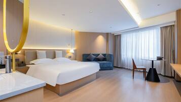 Habitación Confort | Espacio para trabajar con laptop, wifi gratis y ropa de cama
