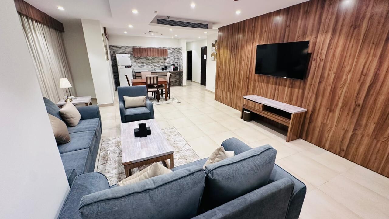 Suite, 2 chambres | Coin séjour | Cheminée