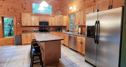 Log Lodge · Hot Tub · Game Room · King Suites