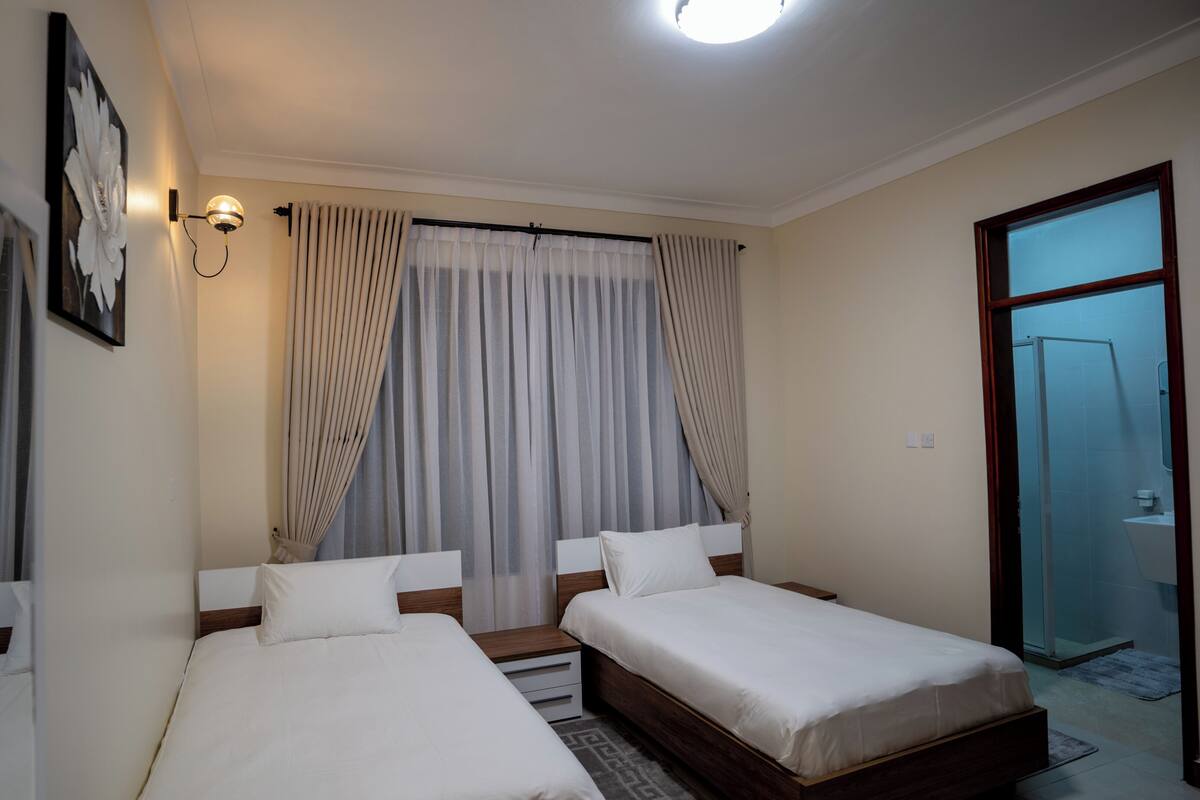 Deluxe Twin Room | Peti besi dalam bilik, Wi-fi percuma, cadar katil 