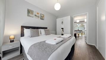4 bedrooms, desk, iron/ironing board, travel cot