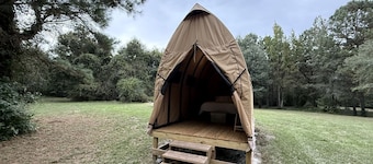 Canvas Cabin with Fire Pit for a Cozy Glamping Escape in Branchville, South Carolina