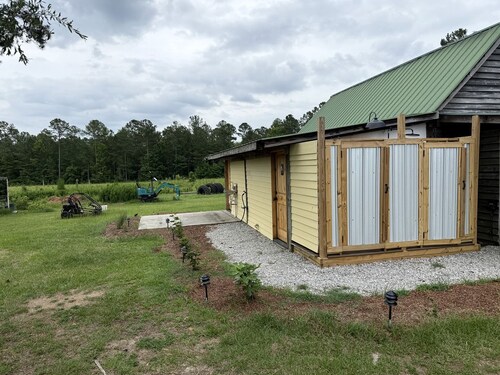 Canvas Cabin with Fire Pit for a Cozy Glamping Escape in Branchville, South Carolina