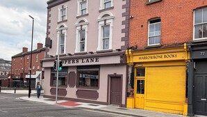 A street view with a building labeled 'Piers Lane' and 'Marrowbone Books' across the street.