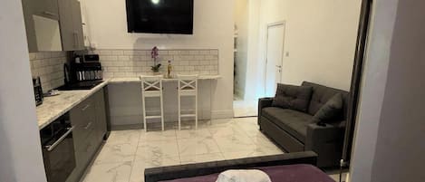 1 chambre, fer et planche à repasser, Wi-Fi gratuit, draps fournis