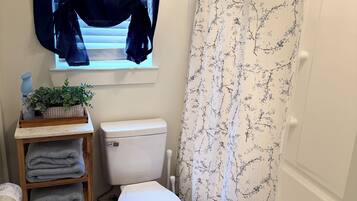 Hair dryer, towels, soap, toilet paper