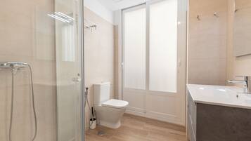 Apartment, 1 Bedroom | Bathroom | Shower, hair dryer, towels, soap