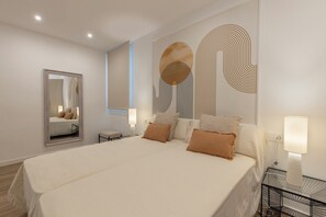 A modern bedroom with a large bed, a bedside table with a lamp, a wall-mounted mirror, and abstract wall art. - BIBO SUITES CASA NAWAL (Granada)