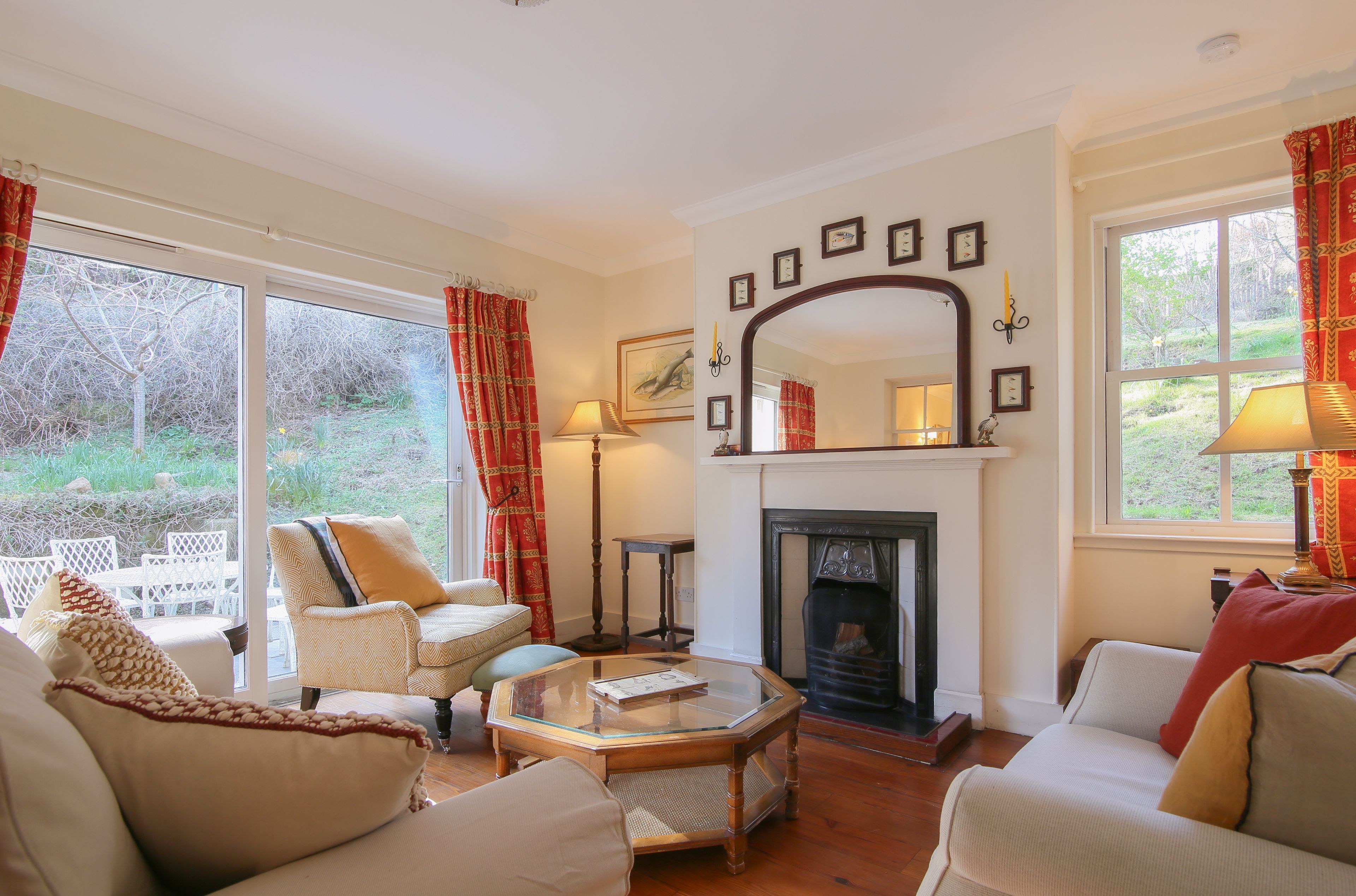 Enjoy natural light and refined comfort in this elegant living space.