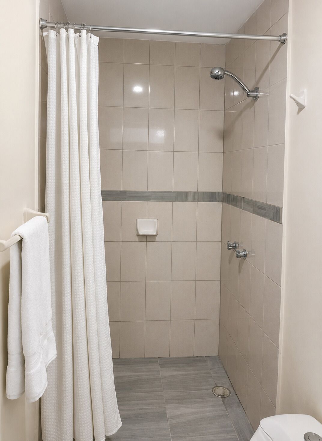 Shower, towels, soap, shampoo