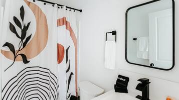 Hair dryer, towels, soap, toilet paper