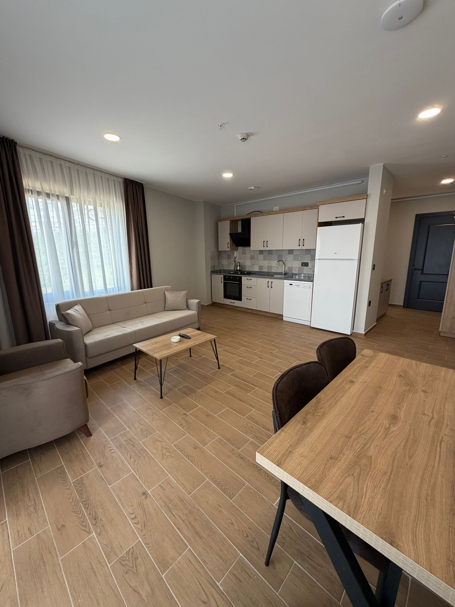 Comfort Apartment, Balcony, Sea View | Desk, laptop workspace, blackout drapes, iron/ironing board