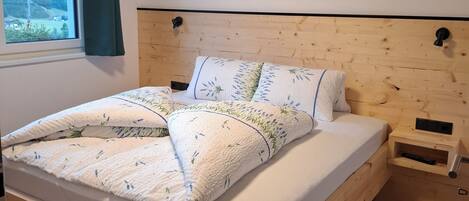 2 bedrooms, travel crib, WiFi, bed sheets