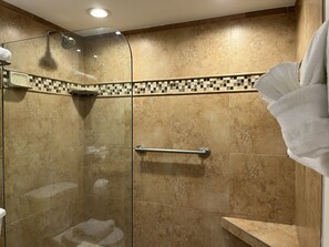 A shower with a glass door, a handrail, and a tiled showerhead. - OCEAN FRONT CONDO, Lahaina Shores Beach Resort, Maui, Hawaii
Spectacular view (Lahaina)