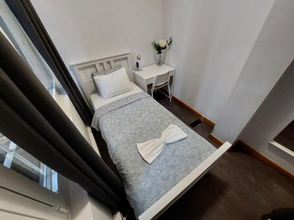 Quarto solteiro, vista para a cidade | Wi-Fi de cortesia