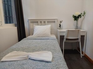 Quarto solteiro, vista para a cidade | Wi-Fi de cortesia