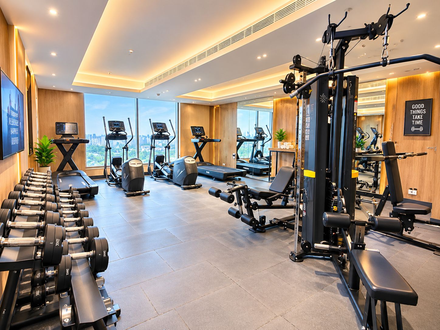 Un gimnasio moderno con máquinas de cardio, pesas libres y banco para ejercicios de fuerza.