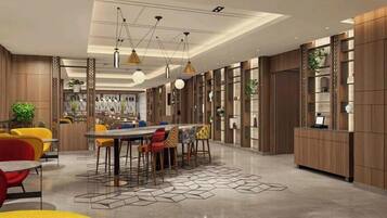 A modern interior with a central dining area, multiple seating options, and built-in shelving.