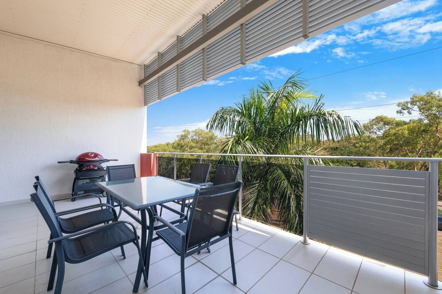 Take in leafy surroundings from the balcony while enjoying breakfast in the open air or planning the day's activities.