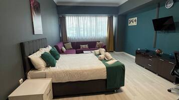 Habitación Deluxe con 1 cama doble o 2 individuales, vistas a la ciudad | Interior