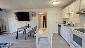 Coffee/tea maker, fridge, microwave, oven