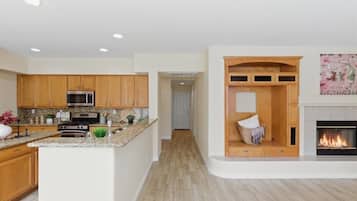 Coffee/tea maker, fridge, microwave, oven
