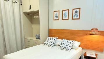 Cortinas opacas, tabla de planchar con plancha, wifi gratis