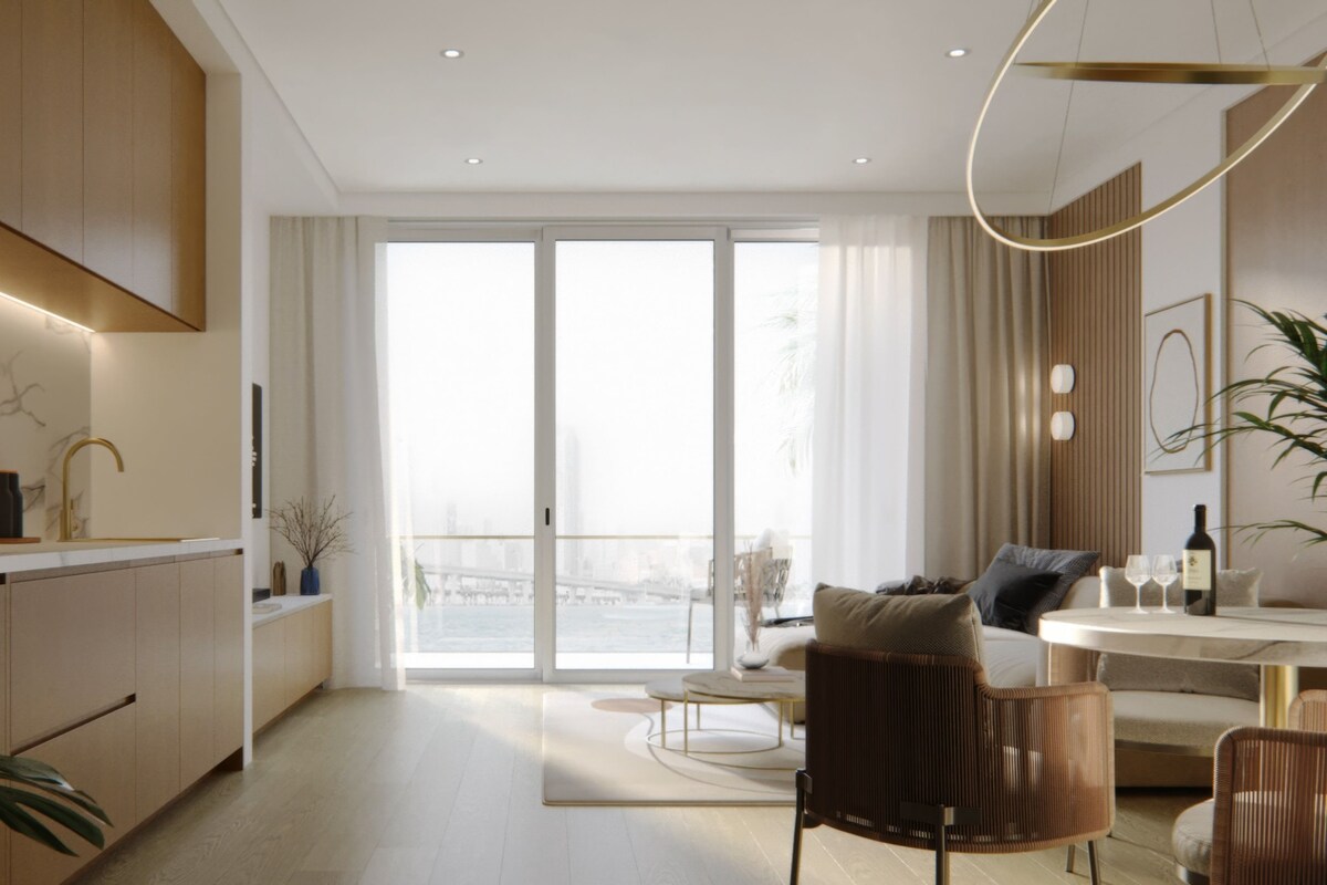 A modern kitchen with a large window, a dining area with a table and chairs, and a view of the cityscape.