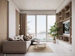 A modern living room with a sofa, coffee table, and a large window with a city view. - Vida Hotel & Residences (Miami)
