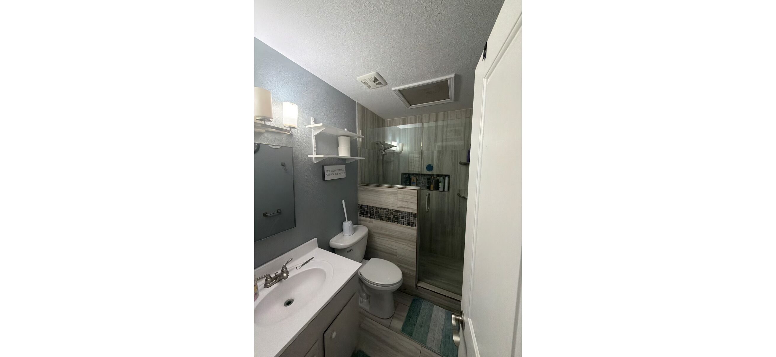 Shower, towels, soap, toilet paper