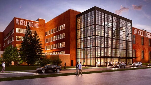 A modern building with a prominent glass facade and a brick exterior. - Chic Stay in Wortley – Walk to Downtown & Parks (London)