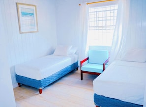 A room with two beds, a chair, and a window with curtains. - Endless Summer - by Zenbreak (Inch Marlowe)