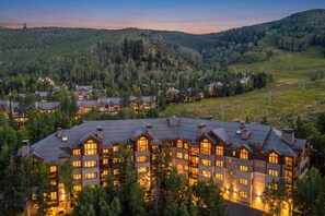 A large lodge with multiple buildings, surrounded by forested hills. - Ski-in/ski-out Beaver Creek with Hot Tub & Pool (Beaver Creek)