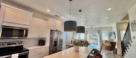 Coffee/tea maker, fridge, microwave, oven