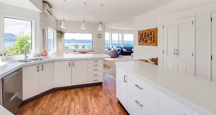 Serendipity Too- panoramic lake views, and contemporary interiors