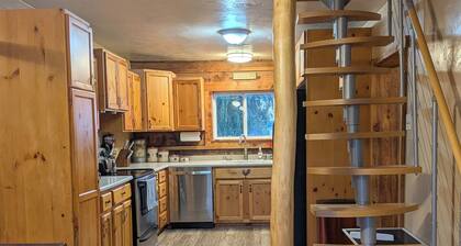 Cozy & rustic, yet modern cabin w/lots of charm. Located on working cattle ranch