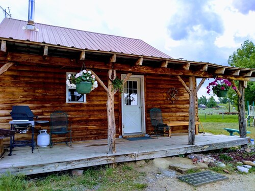 Cozy & rustic, yet modern cabin w/lots of charm. Located on working cattle ranch