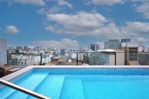 A rooftop pool with a cityscape view. - Miraflores via Larcomar / gym / Balcón Street and pool (Miraflores)