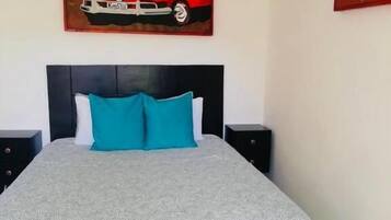 Habitación, 1 cama Queen size, vista al jardín | Wifi gratis