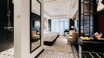 Family Triple Room, Balcony, Garden View | Bathroom | Shower, hair dryer, slippers, towels