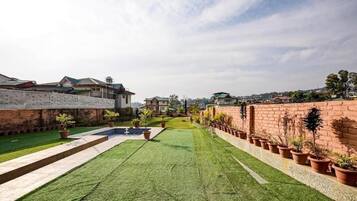 Deluxe Double Room, Balcony, Mountain View | Property grounds