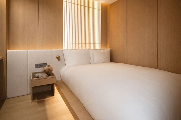 Private Spa Suite - Plaza View | Blackout curtains, iron/ironing board (on request), free WiFi