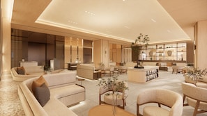 Un hall d’hôtel moderne avec des canapés, un comptoir d’accueil et un espace bar.