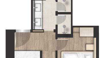 Layout de quarto de hotel com cama, área de estar, banheiro e piscina.