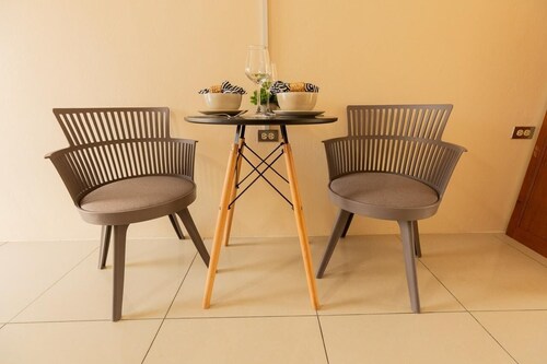 Cozy Studio in Arima with AC, WiFi & self check-in. Near to airport & shops