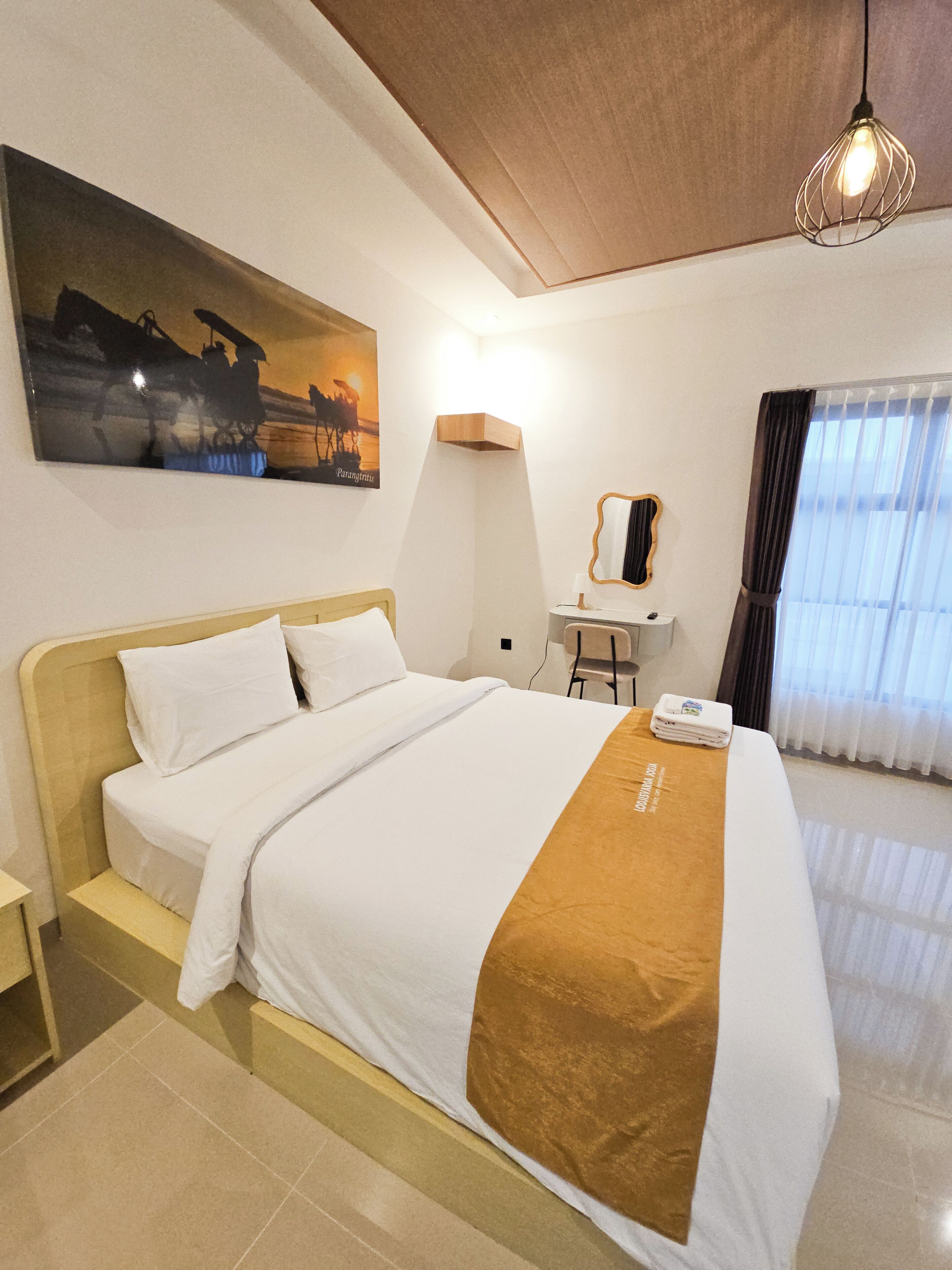 Deluxe Studio, Patio, Pool View | In-room safe, desk, laptop workspace, blackout curtains