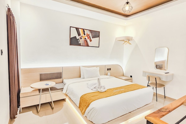Premium Suite, Patio, Pool View | In-room safe, desk, laptop workspace, blackout drapes