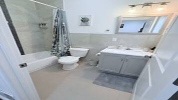 Hair dryer, bidet, towels, soap