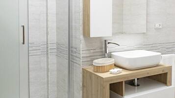 Hair dryer, bidet, towels, soap